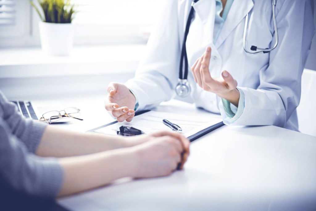 physician participating in salary negotiation with hiring manager