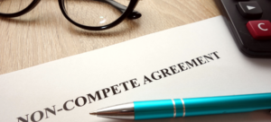 physician reviewing their non compete agreement before signing their physician employment contract