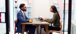 a physician being interviewed for a job at a medical facility